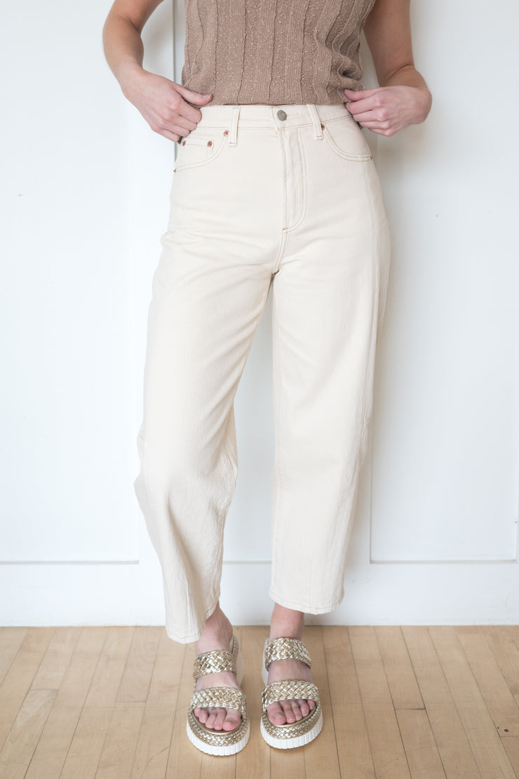 eli high rise arched leg jean