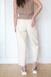 eli high rise arched leg jean