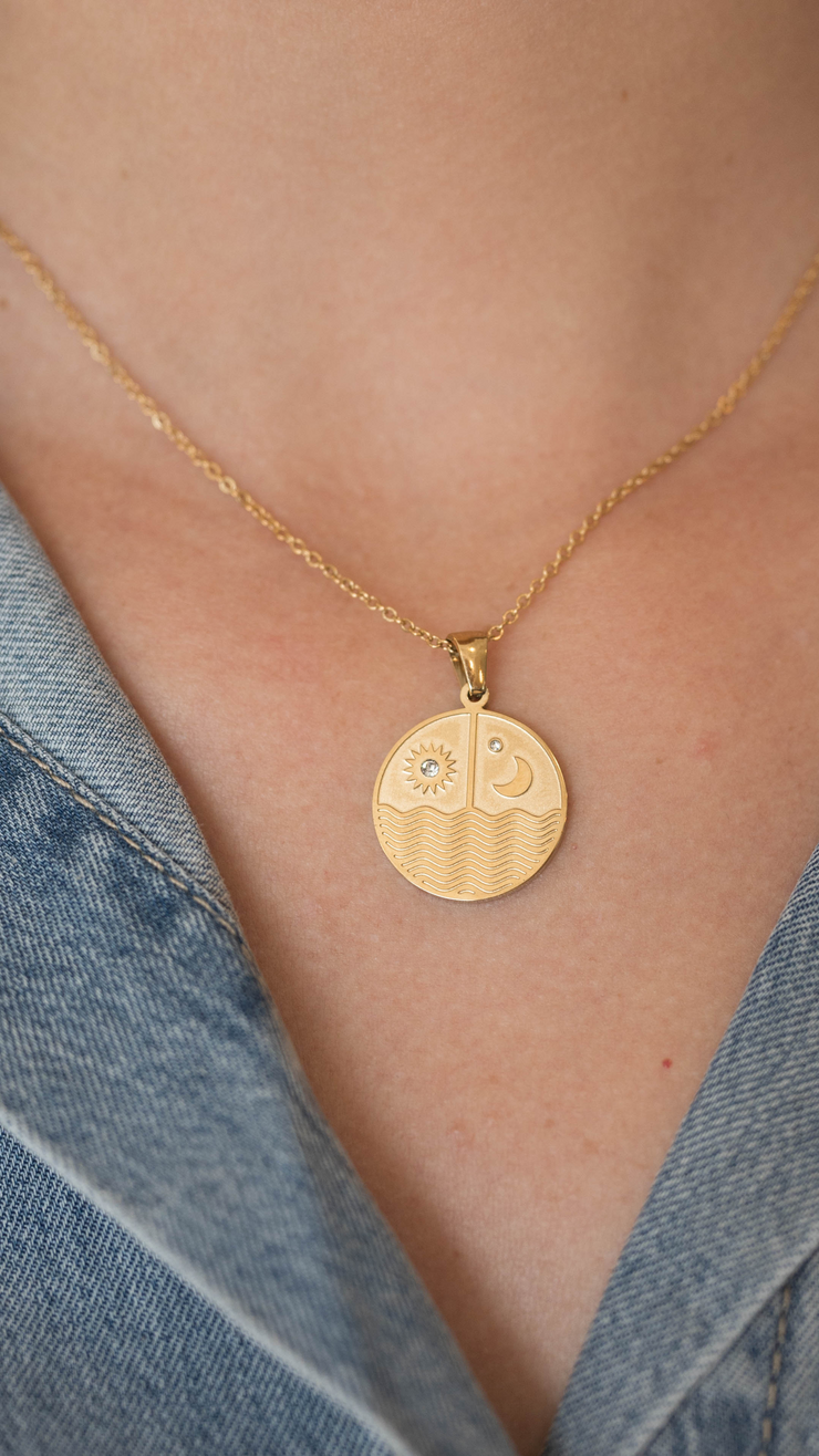 trust the tide necklace