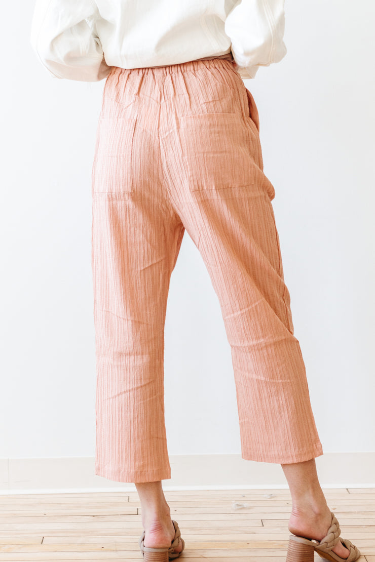 pink skies textured trousers
